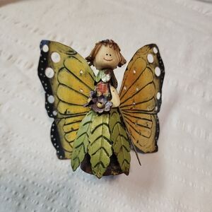 Whimsical Fairy Sculpture with Yellow and Green Accents
